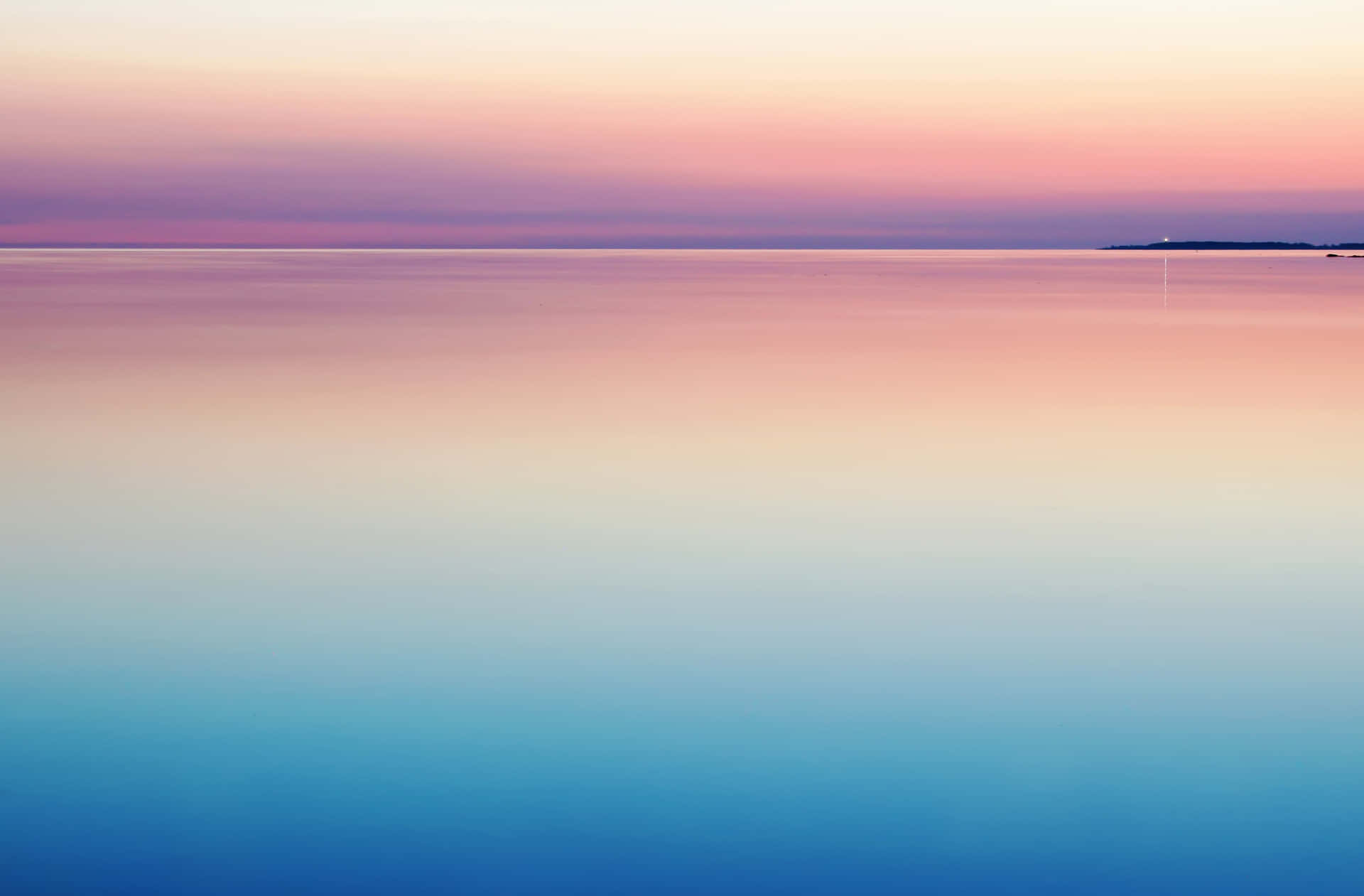 Blue And Purple Sunset With Calm Waters Wallpaper
