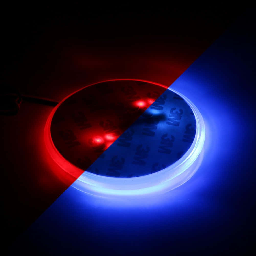 Glowing Disc Blue And Red Background
