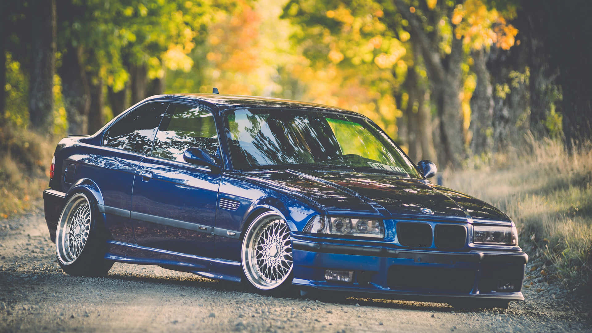 Blue B M W E36 Coupe Autumn Backdrop Wallpaper