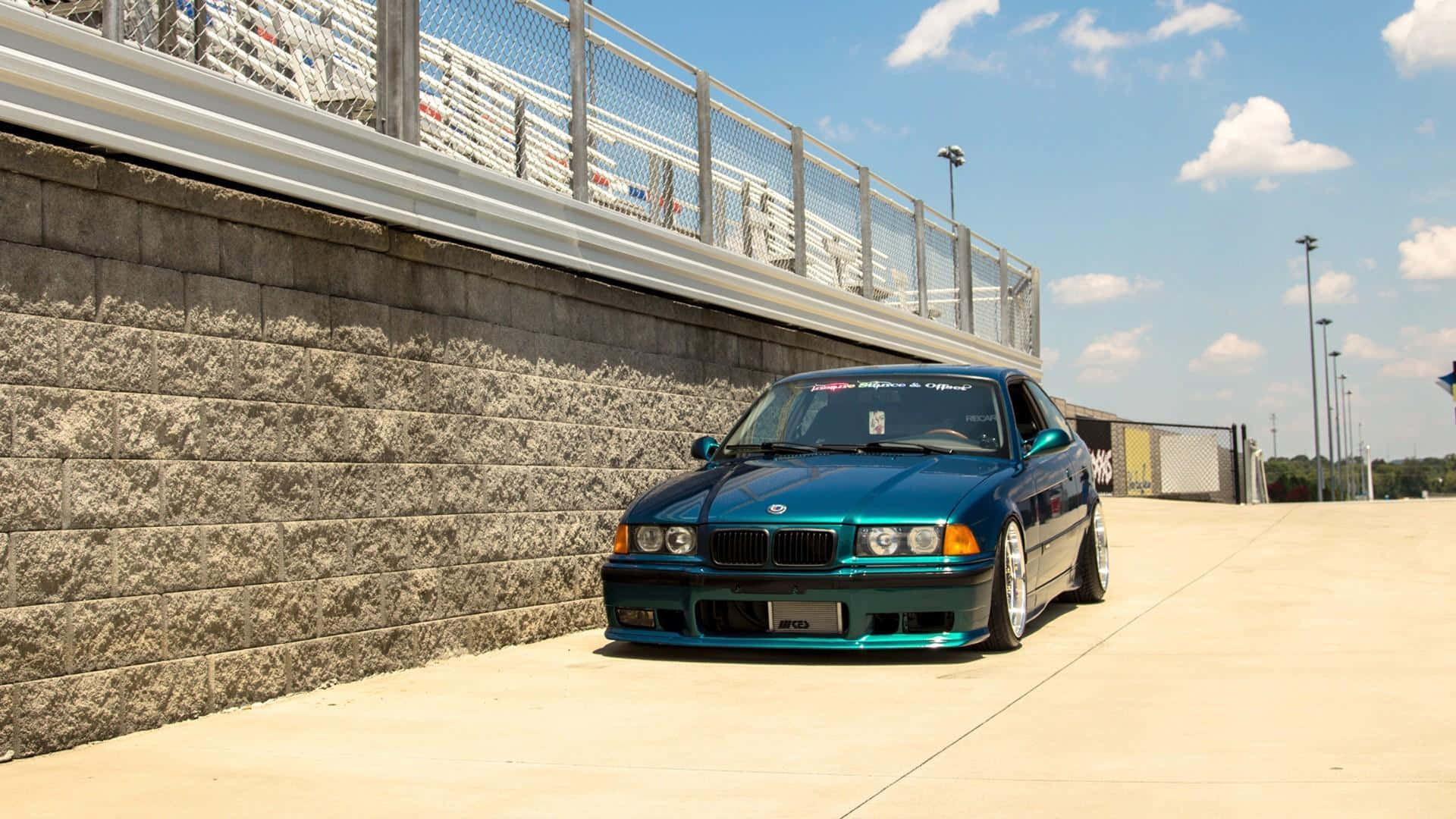 Blue B M W E36 Coupe Racetrack Side View Wallpaper