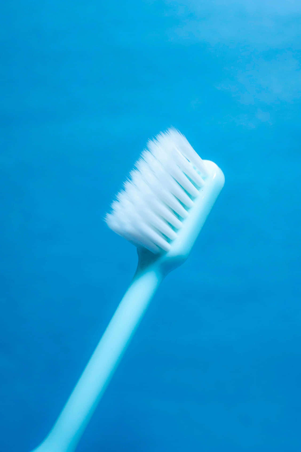 Blue Background Toothbrush Wallpaper