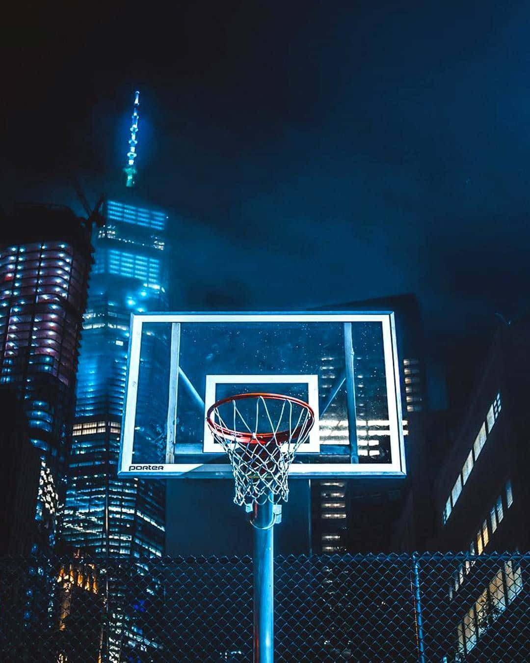 Blue Basketball Ring And Skyscrapers Wallpaper