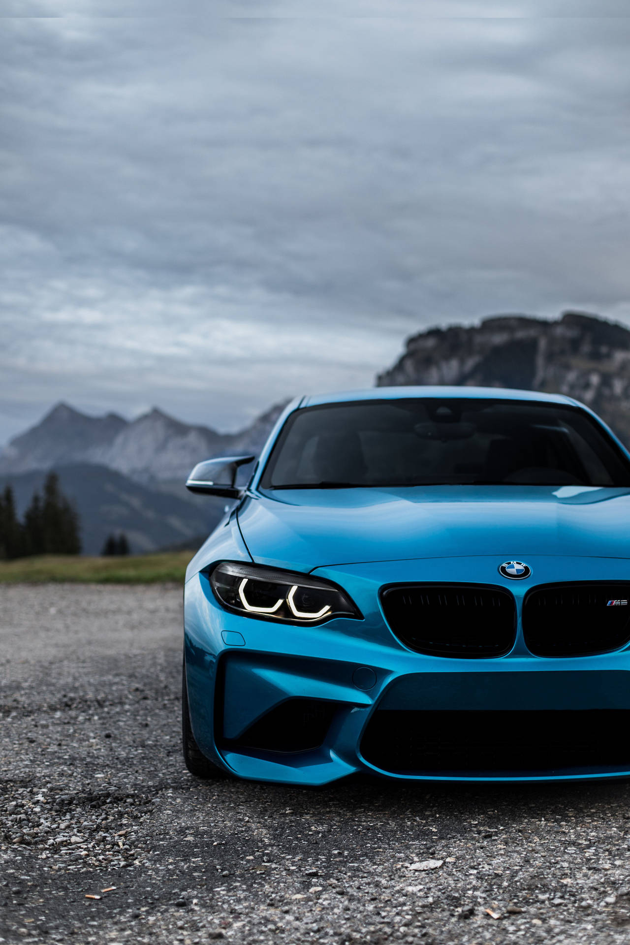Blue Bmw Parked Outdoors Wallpaper