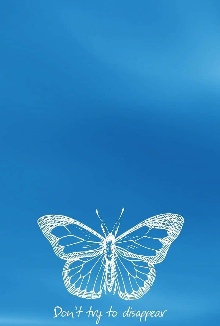 A beautiful blue butterfly basking in the sun's light.