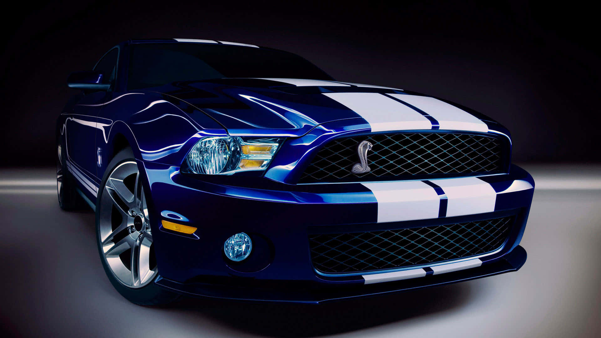 A Sleek Blue Luxury Sports Car Wallpaper