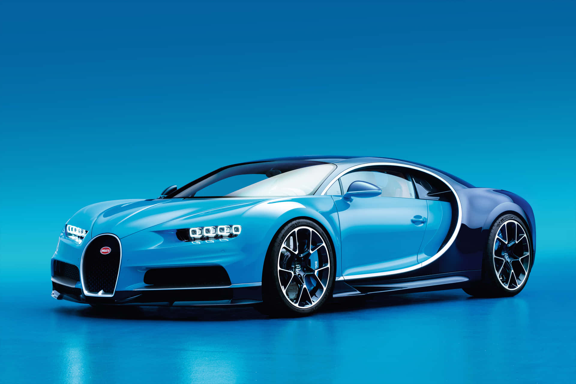 A Stunning Blue Sports Car - Ready To Take On The Road Wallpaper