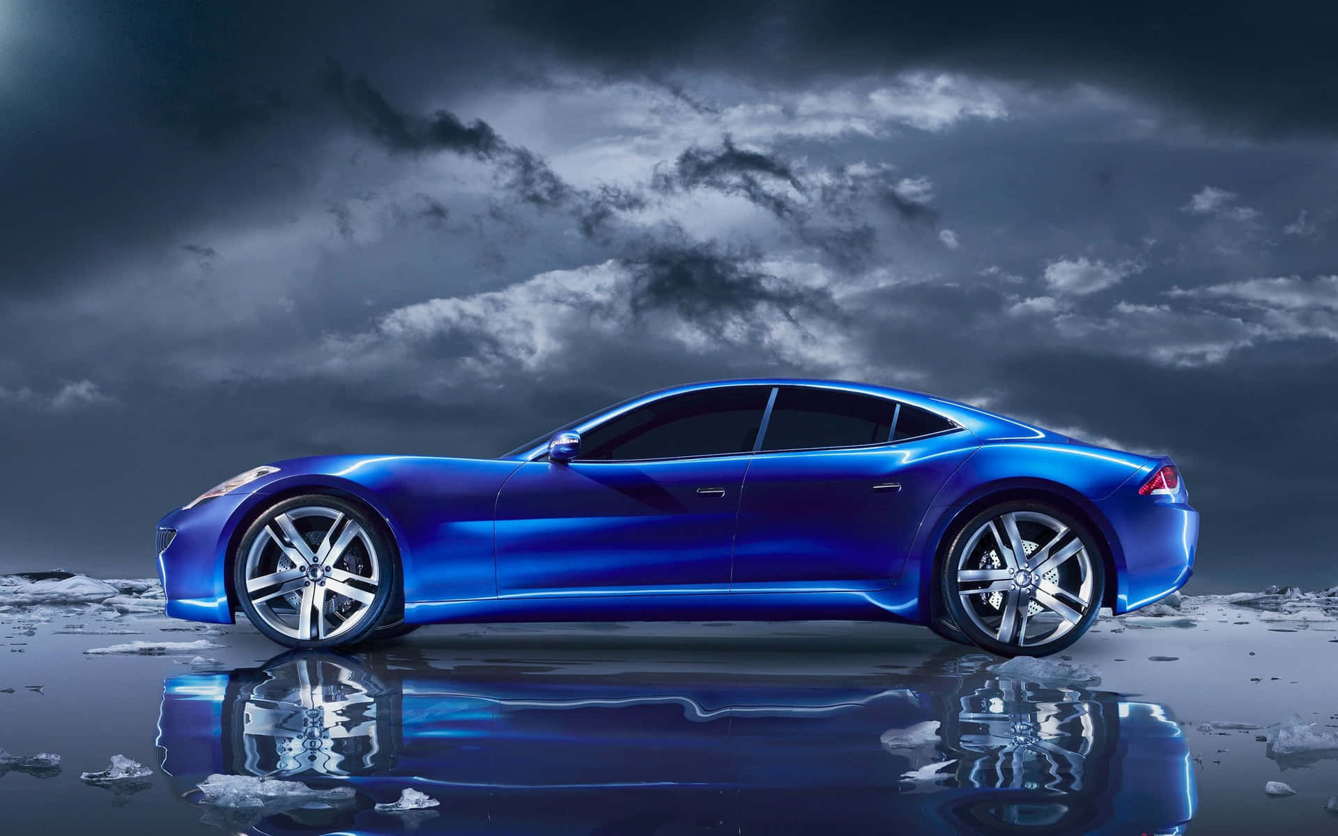 A Blue Sports Car Is Parked On Ice In The Water Wallpaper