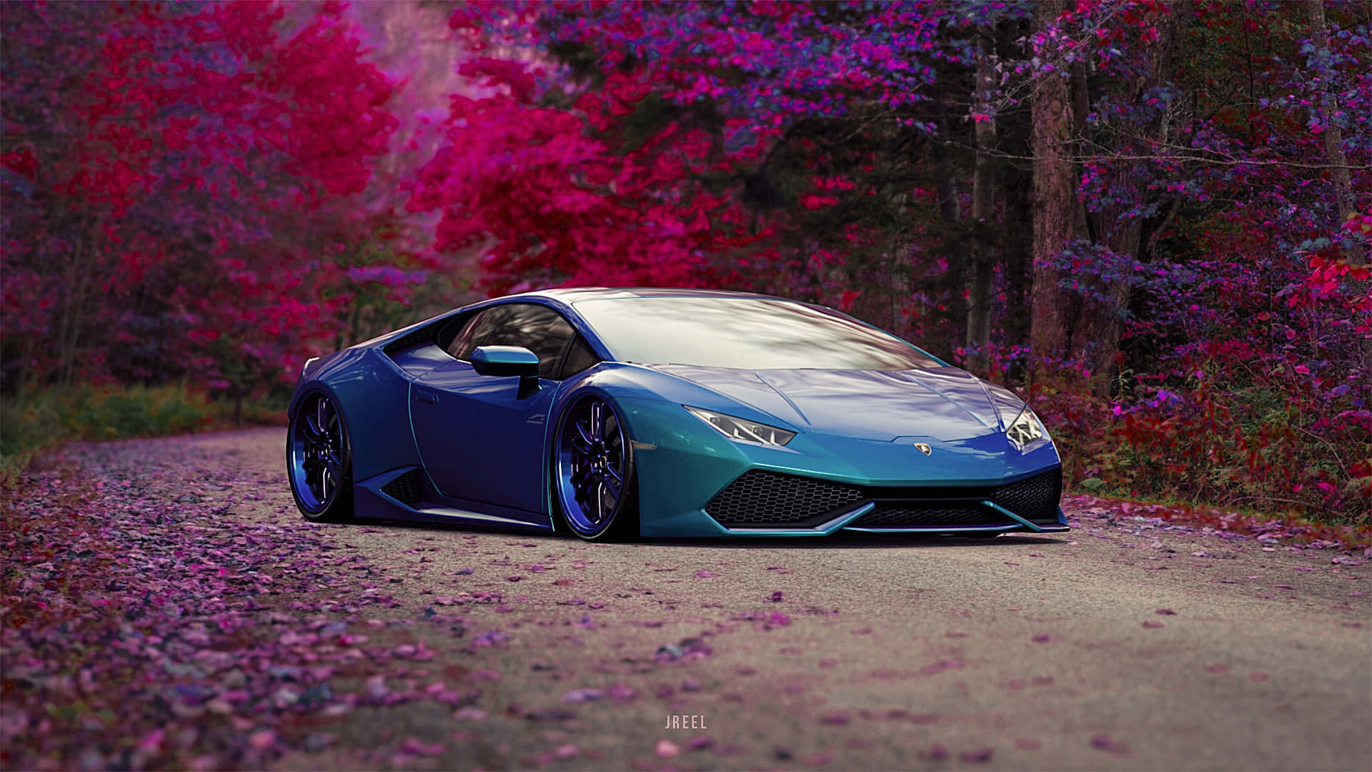 A Blue Sports Car Parked In The Forest Wallpaper