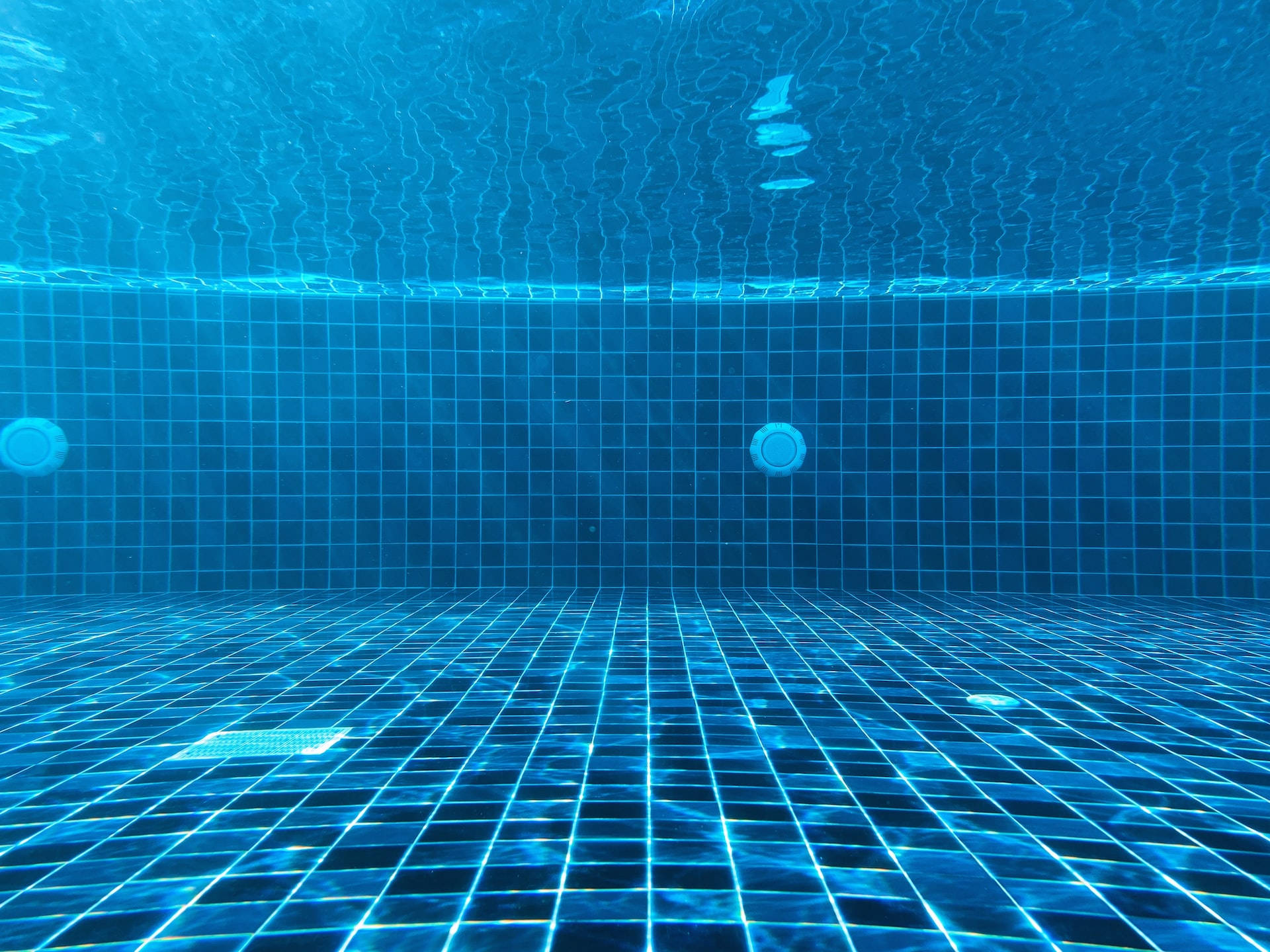 Blue Checkered Pool Flooring Wallpaper