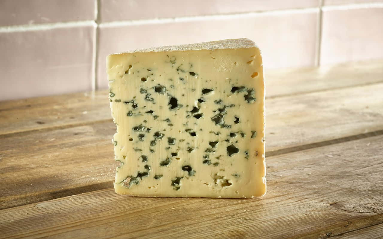 A delicious wedge of blue cheese, perfect for salads or just for snacking" Wallpaper