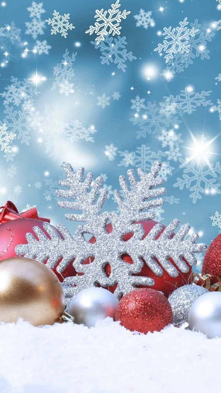 Christmas Ornaments And Snowflakes On A Snowy Background Wallpaper