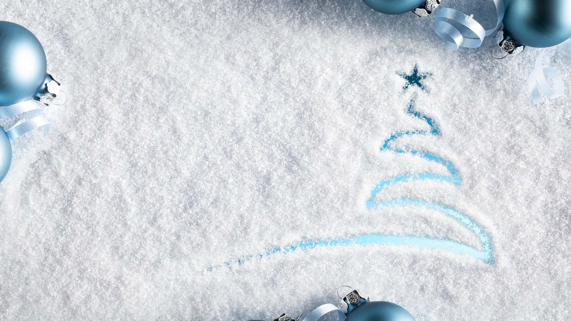 En blå juletræ er tegnet på sneen Wallpaper