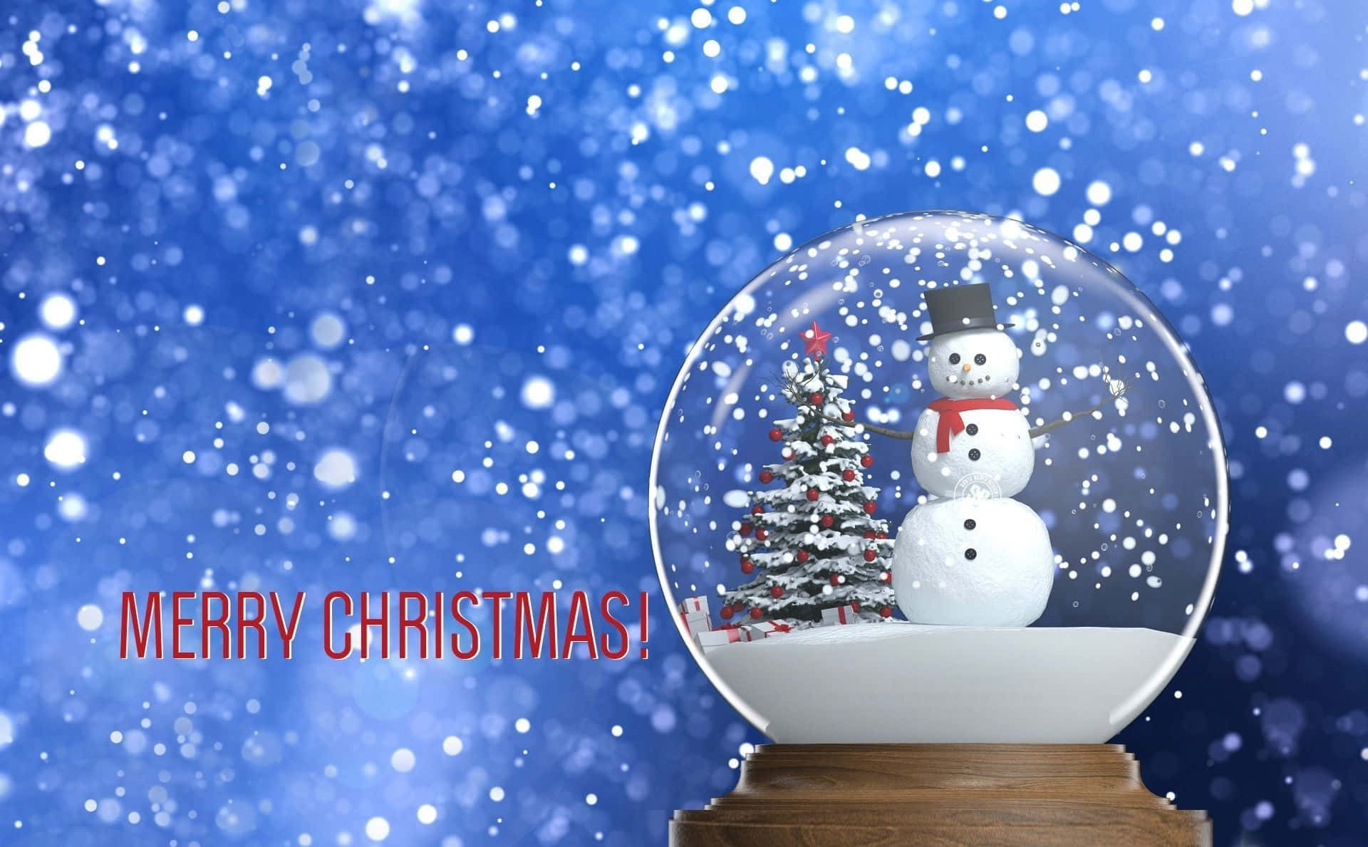 Snow Globe With Snowman And Christmas Tree Wallpaper