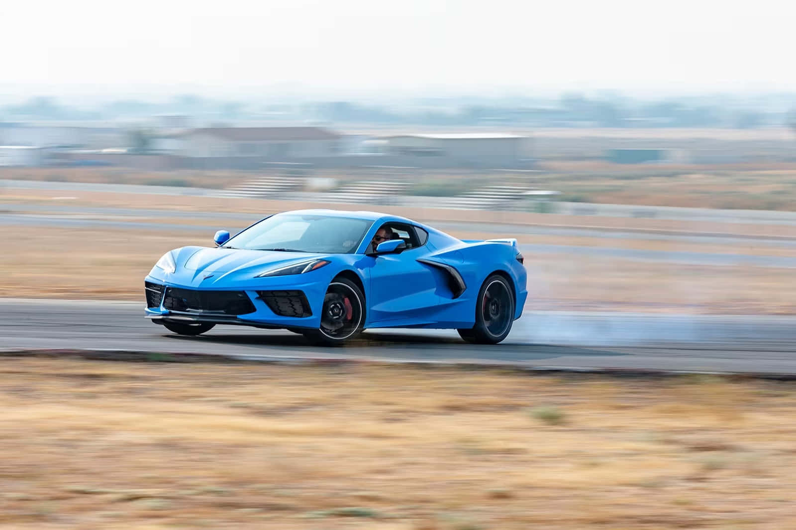 Blue Corvette C8 Speedingon Track.jpg Wallpaper