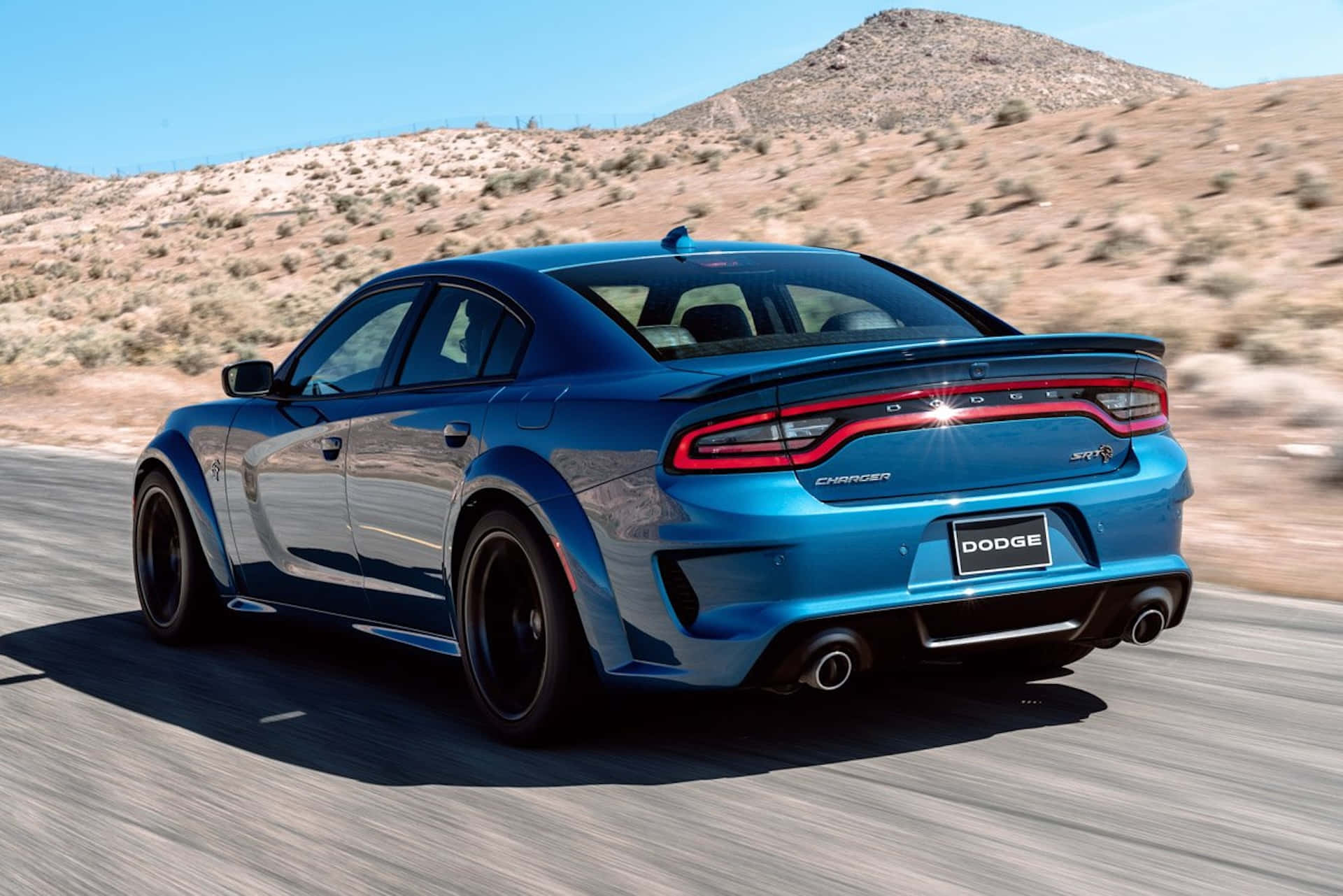 Blue Dodge Charger Hellcat Speeding Wallpaper