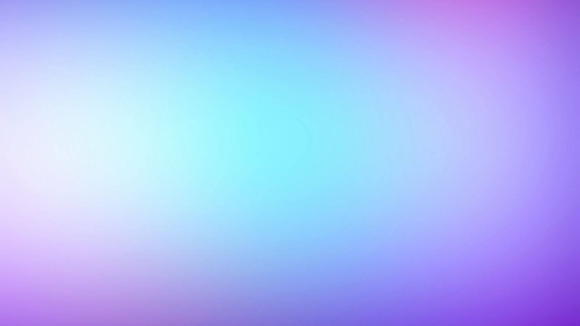 A Blurred Background With Blue And Purple Colors Wallpaper