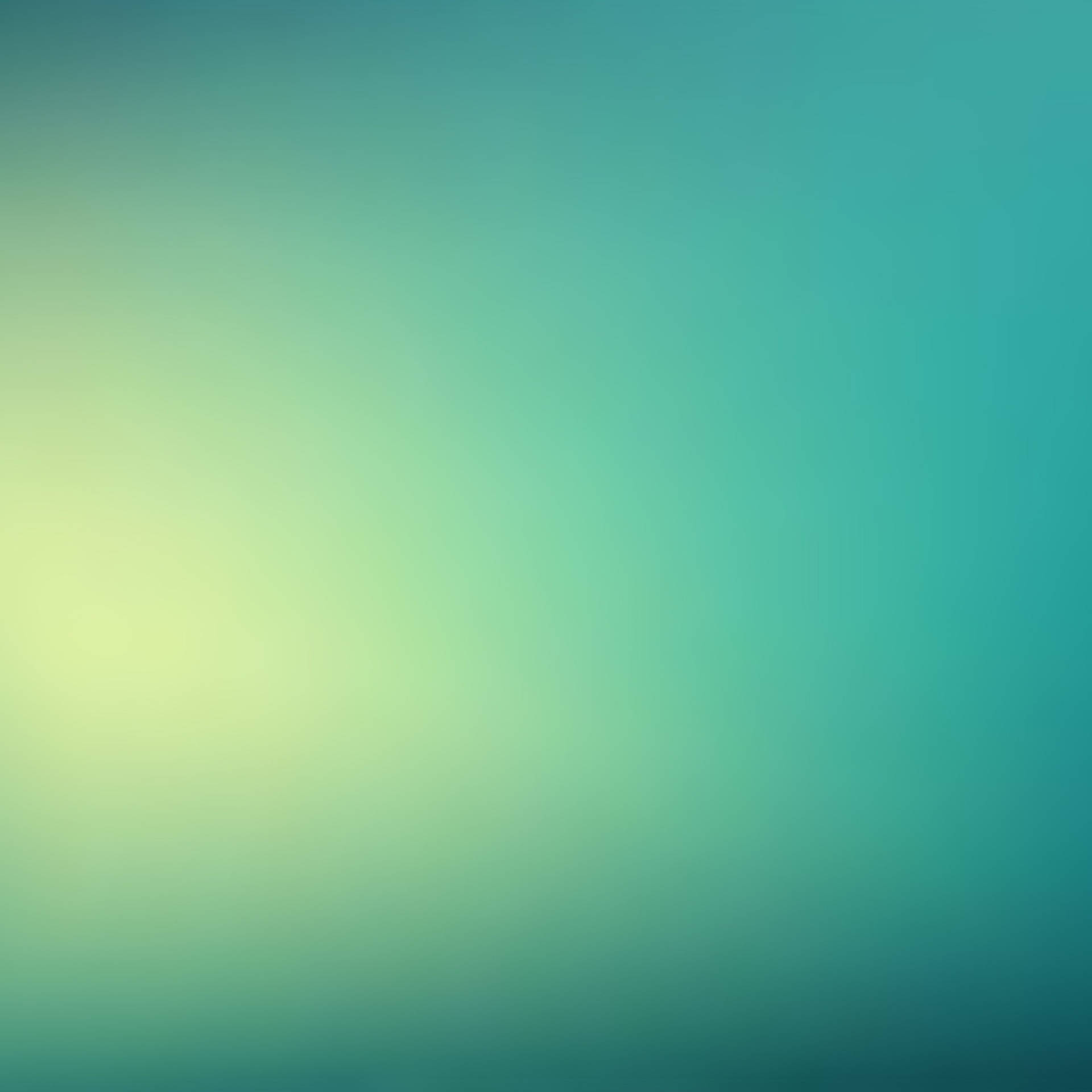 A Blurred Background With A Blue And Green Color Wallpaper