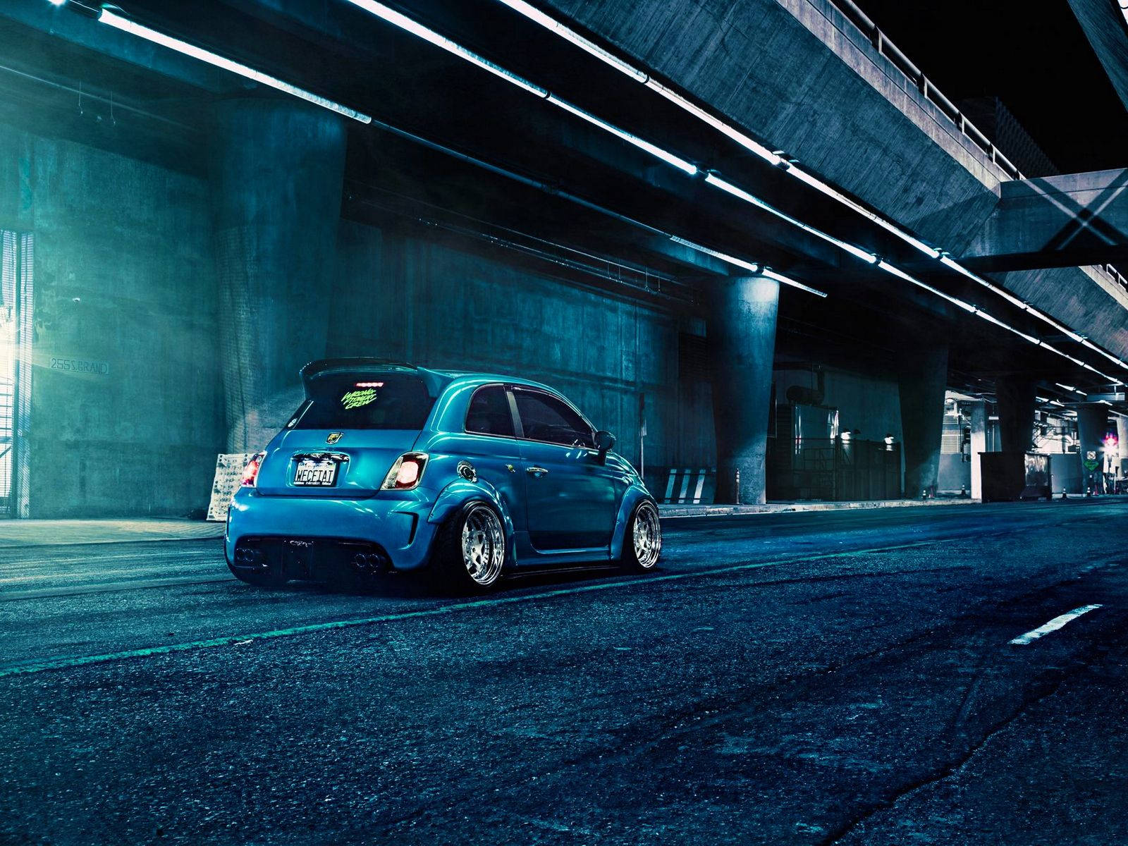 Blue Fiat Abarth 500 Driving