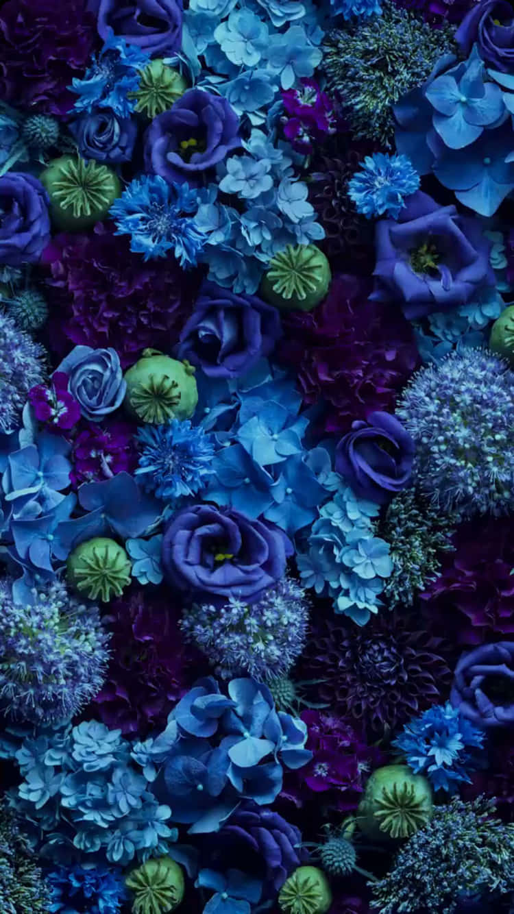 "Indulge in the beauty of Blue Flowers" Wallpaper