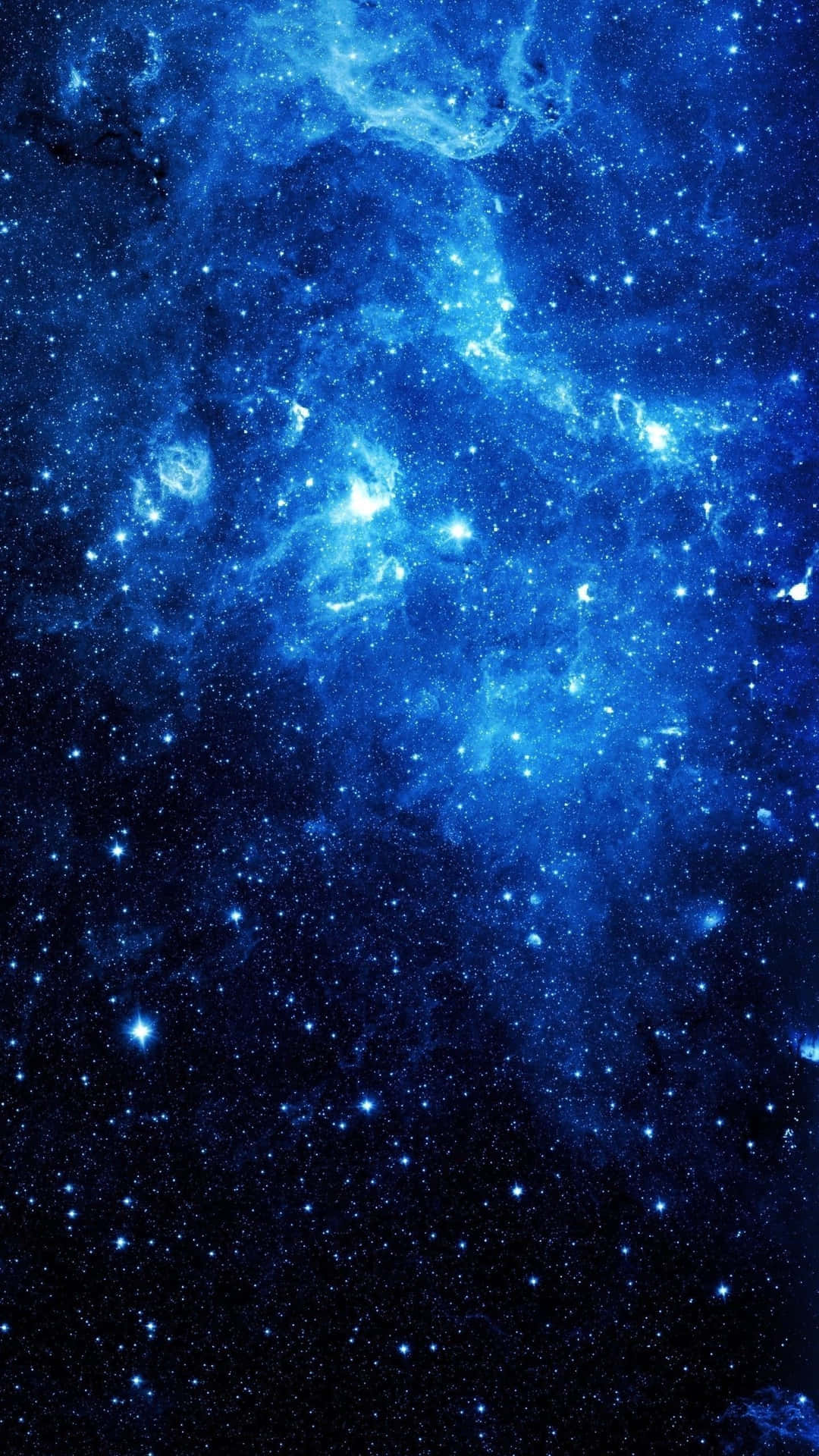 En blå rum med stjerner og nebulaer Wallpaper