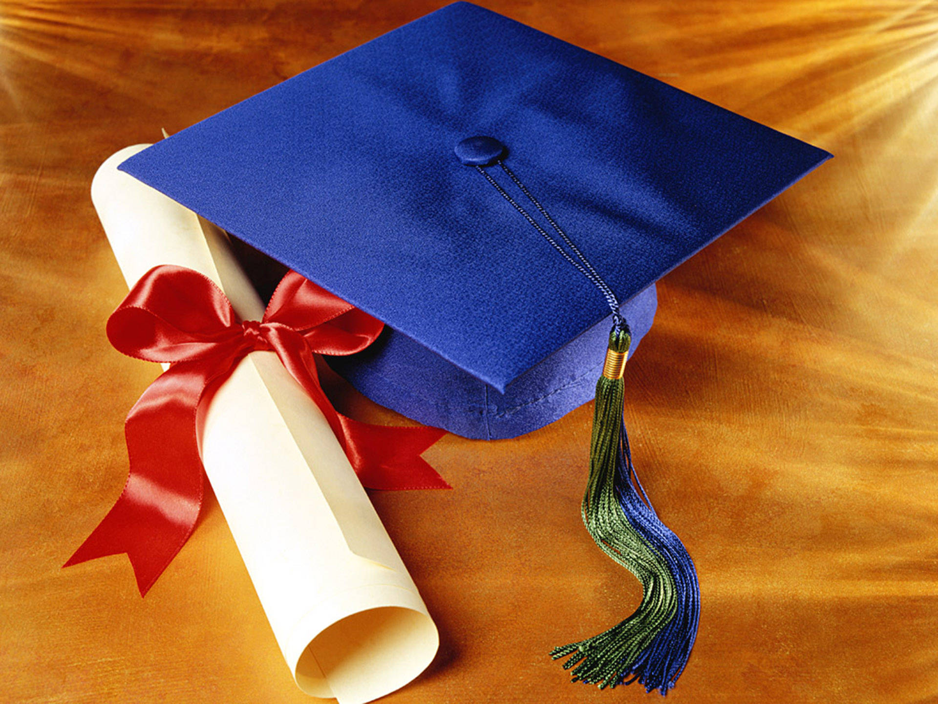 Blue Graduation Cap And Diploma