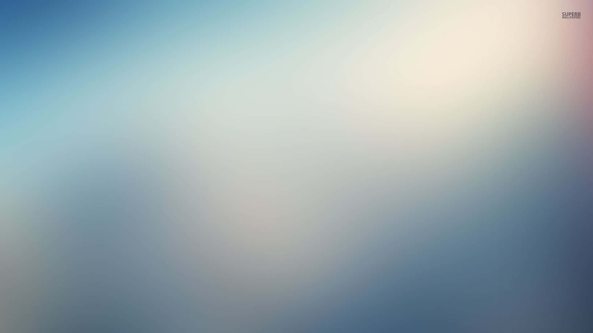 A Blurry Background With A Blue Sky Wallpaper