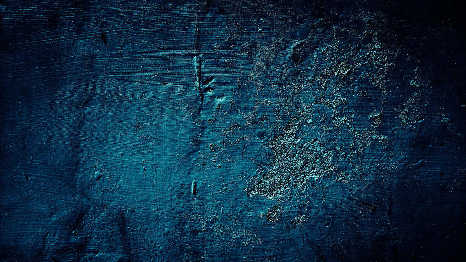 En blå væg med en masse maling på den Wallpaper