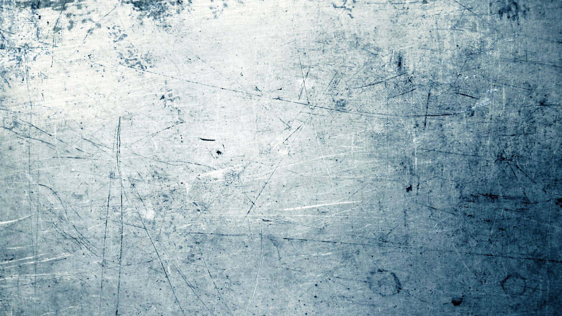 A grungy blue background full of unique texture Wallpaper