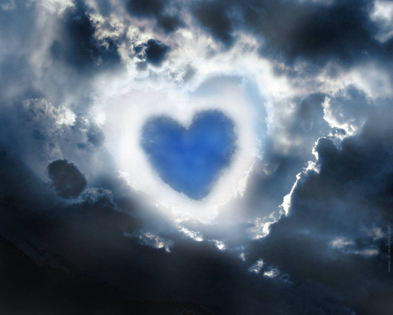 Blue Heart In Dark Sky Wallpaper