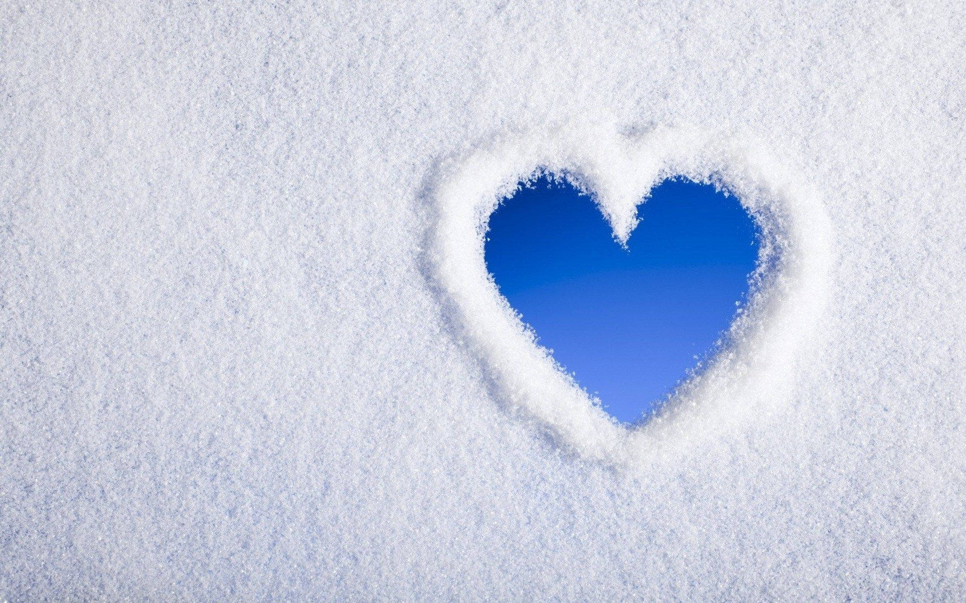 Blue Heart In White Snow Wallpaper