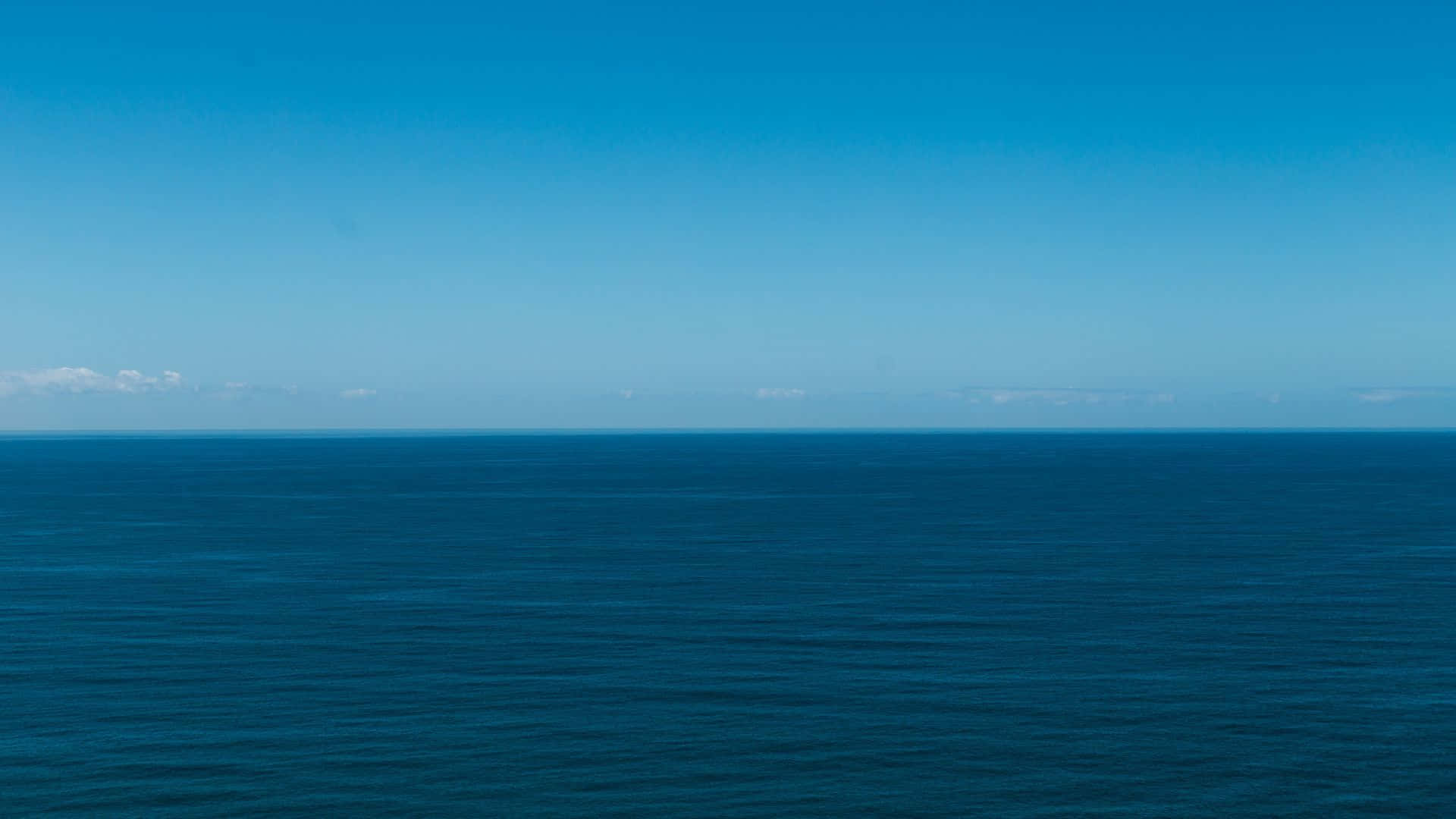 Enjoy a breathtaking view of the sky - Blue Horizon Wallpaper