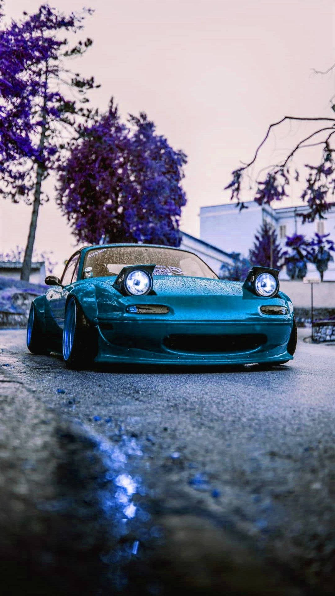 Blue Jdm Car With Funny Face Background