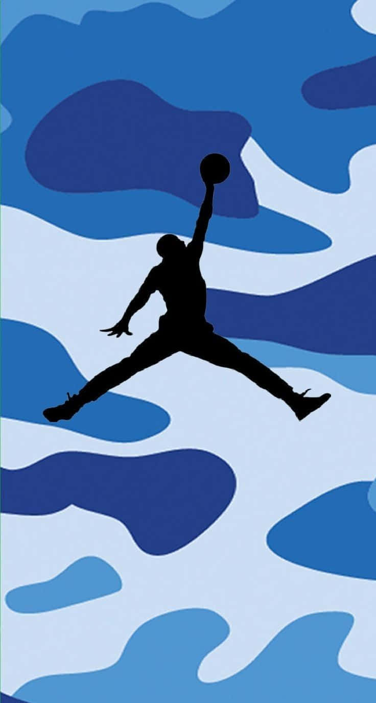 Caption: A Passionate Display of the Classic Blue Jordan Sneakers Wallpaper