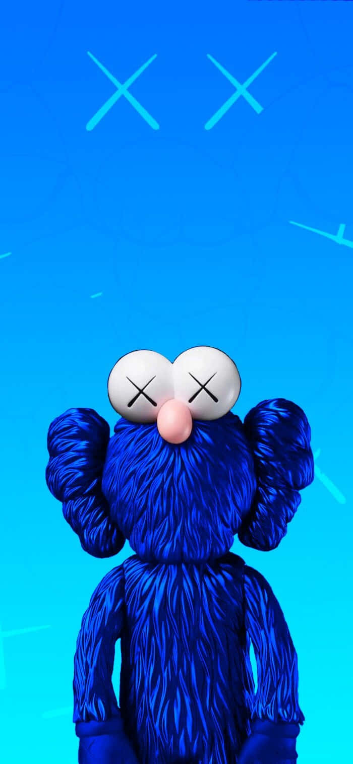 Blue Kaws Figure Against Sky Background Wallpaper