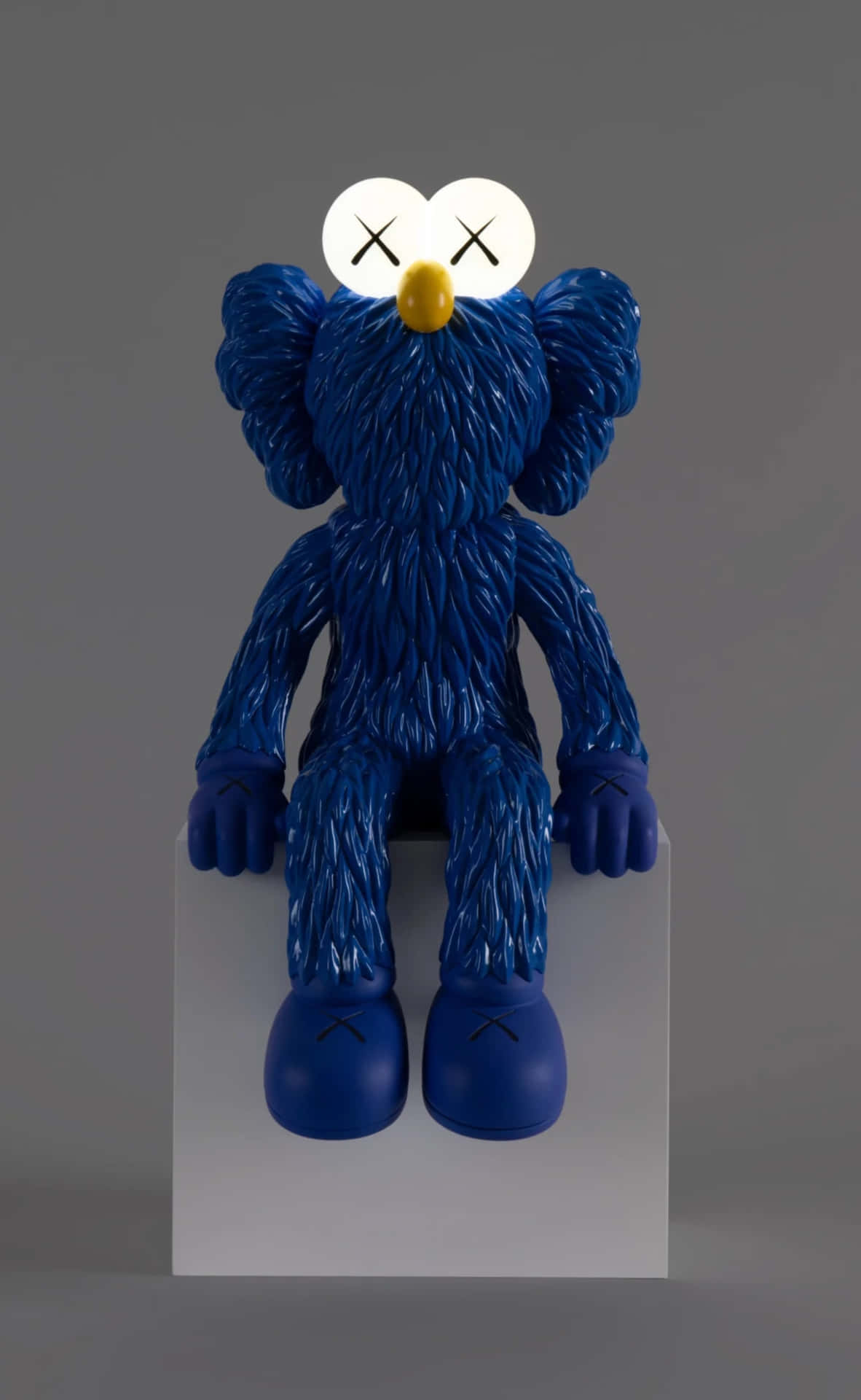 Blue Kaws Figure Sitting Wallpaper