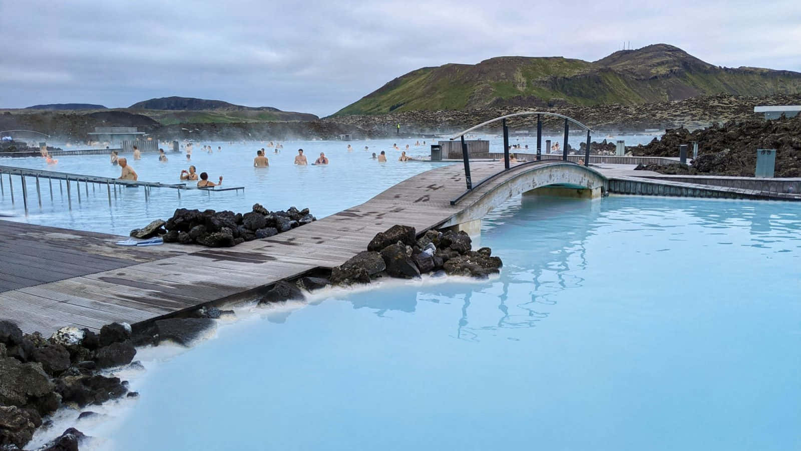 Blue Lagoon Hot Spring Hotel With Tourists Wallpaper