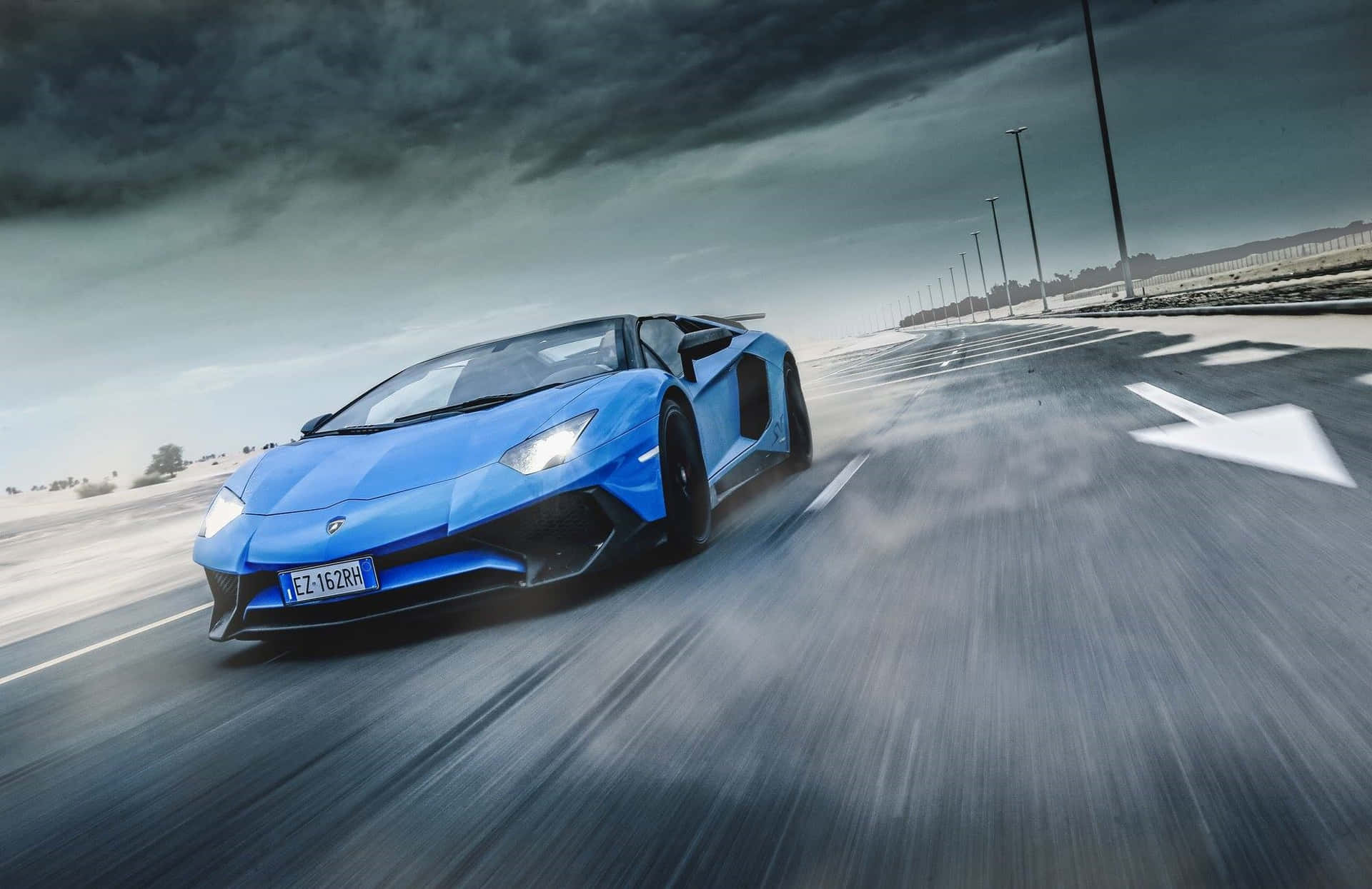 Blue Lamborghini Aventador Action Shot Wallpaper