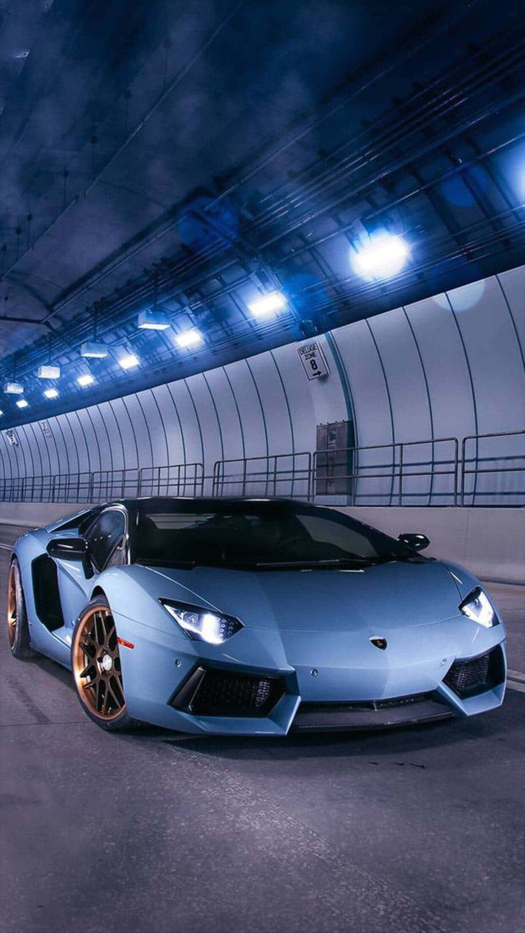 "Set the mood with this stylish blue Lamborghini&iPhone!" Wallpaper