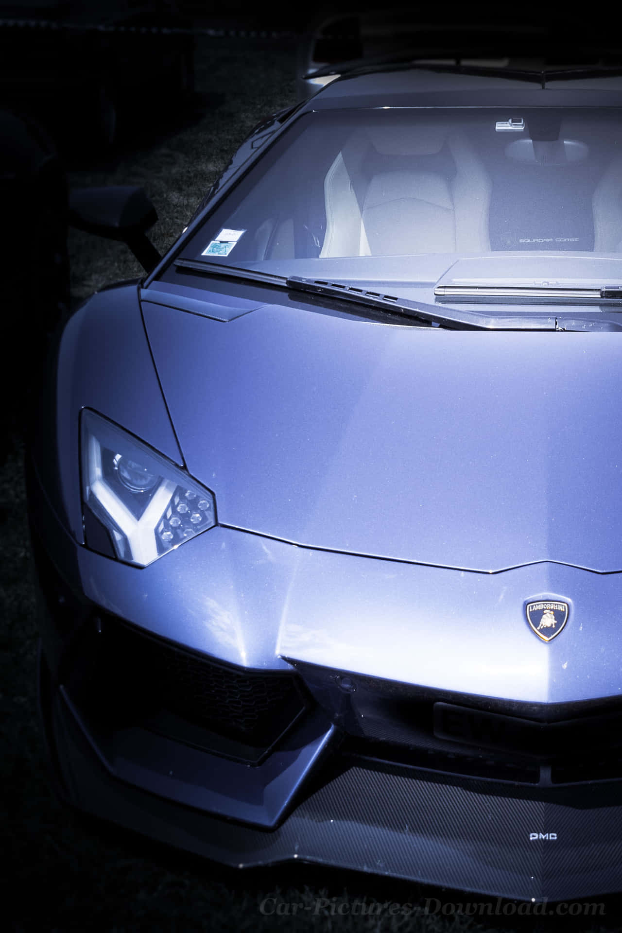 Luksus på farten – et blå Lamborghini Iphone tapet Wallpaper