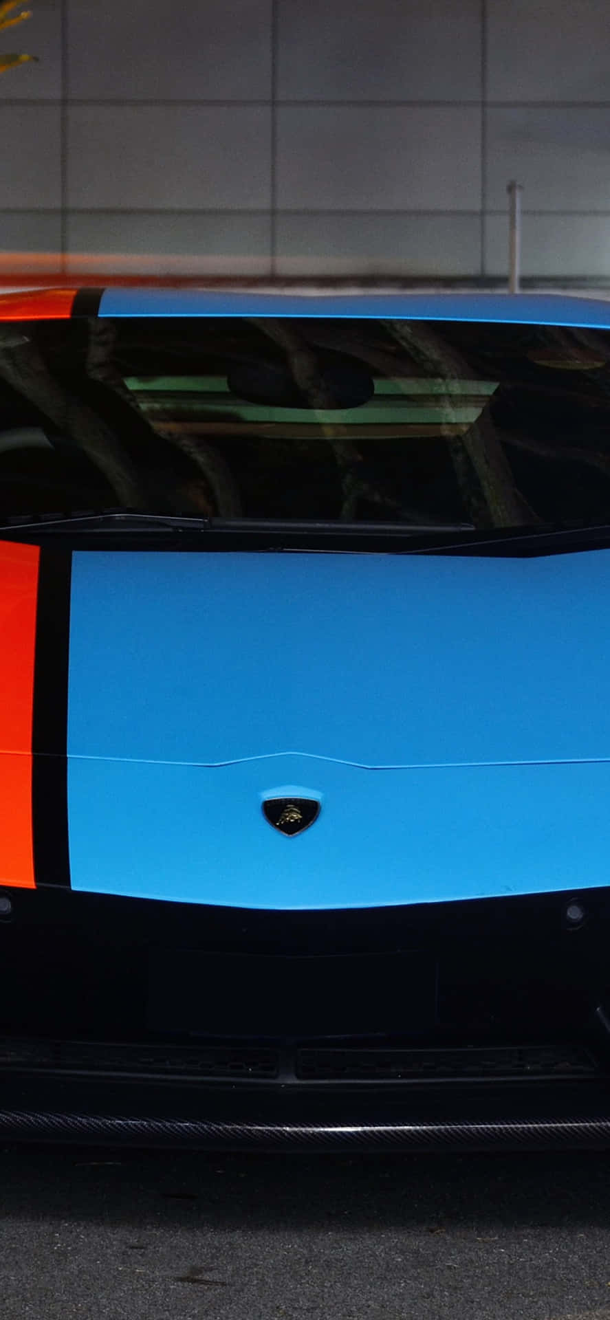 Un'emozionanteperformance E Design Di Lusso Si Uniscono In Questa Sorprendente Lamborghini Blu Per Iphone. Sfondo