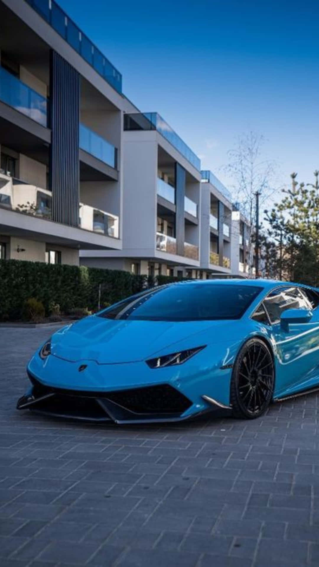Blue Lamborghini Urban Backdrop Wallpaper