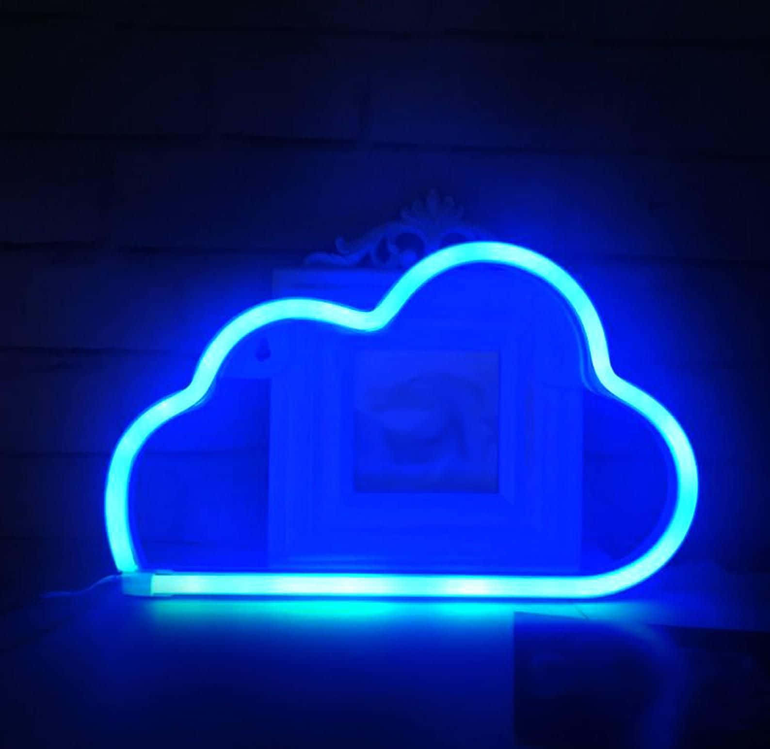 A Blue Cloud Neon Sign With A Picture On It Wallpaper