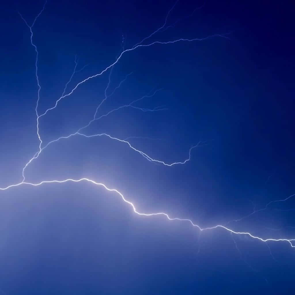 "Electricity in the Sky: Blue Lightning Illuminates the Night"