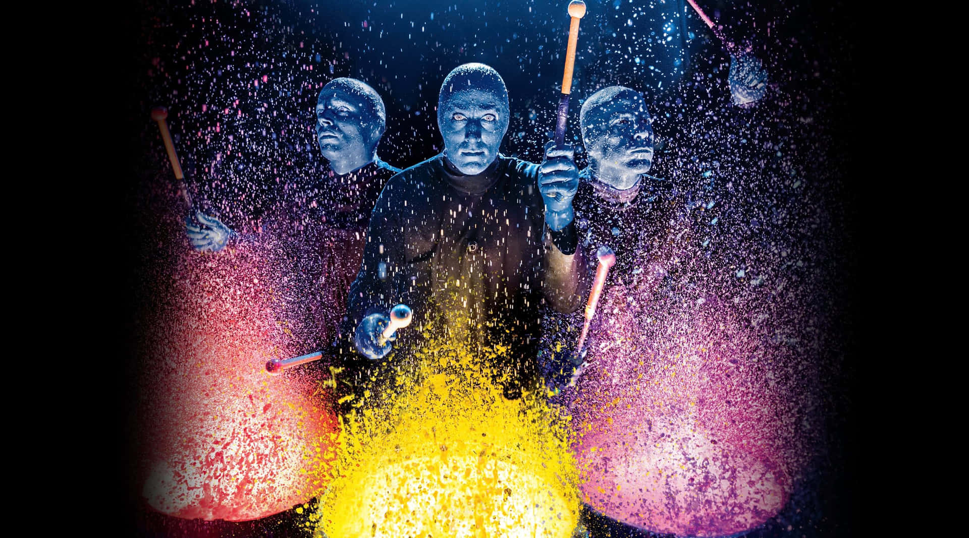 Enjoy the ultimate theatrical experience with Blue Man Group Wallpaper