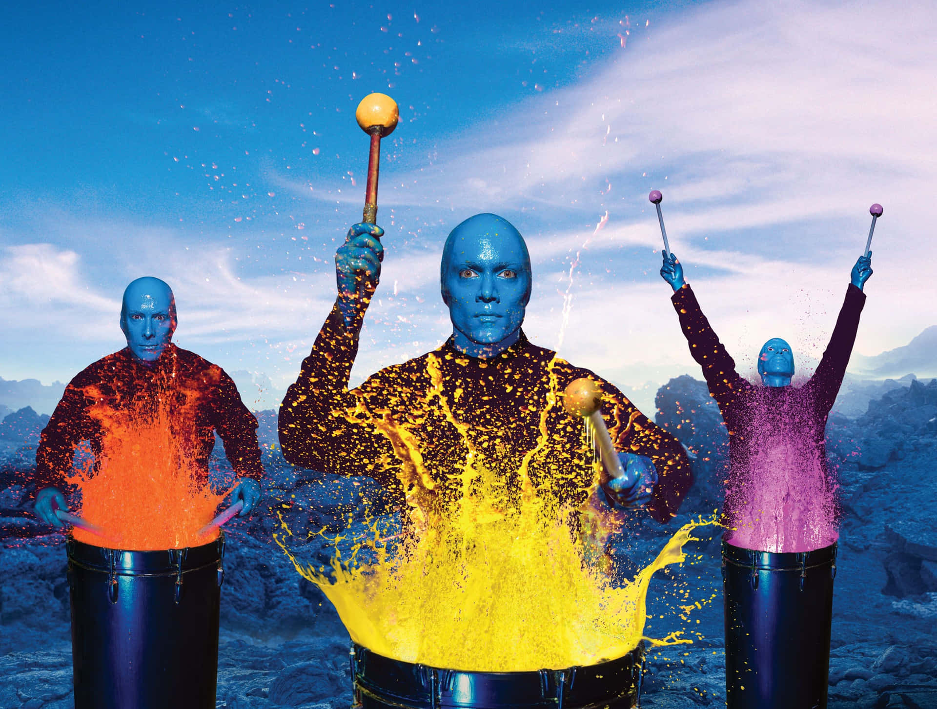Enjoy the thrill of the theatrical experience with Blue Man Group Wallpaper