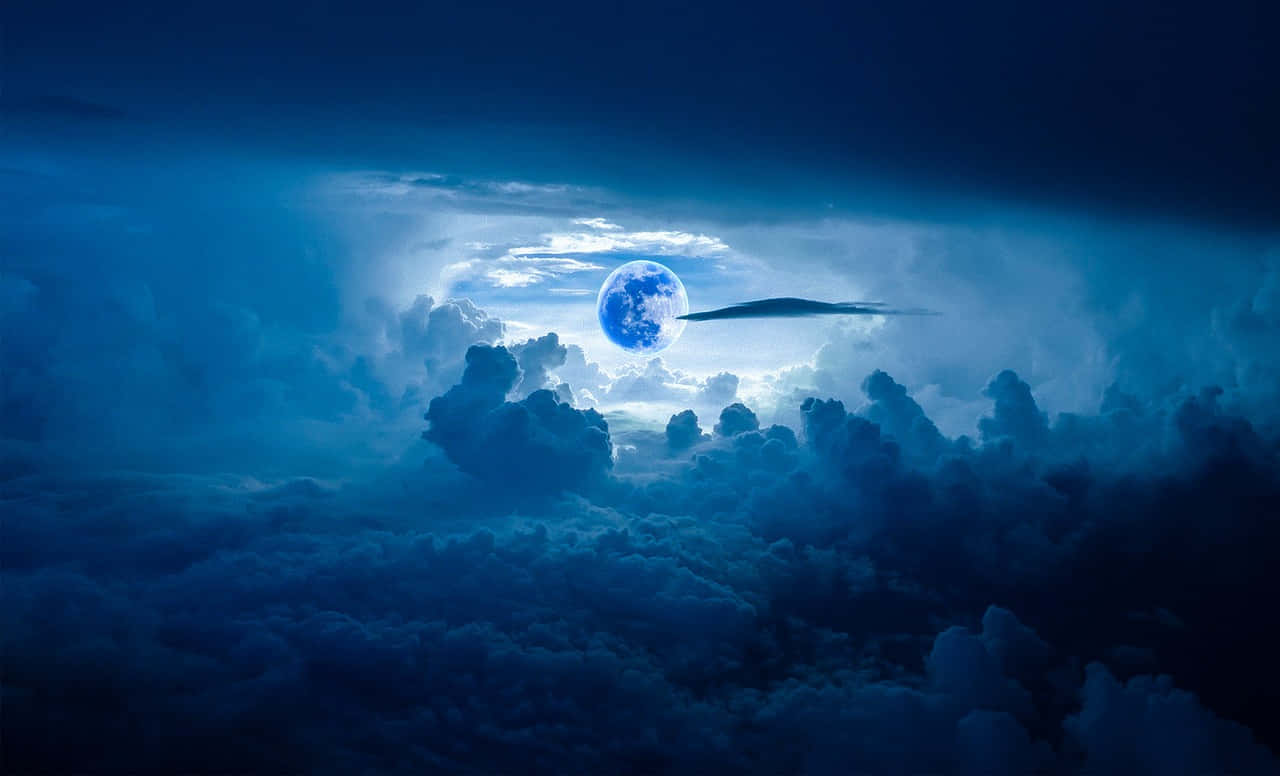 Blue Moon Among Clouds Wallpaper