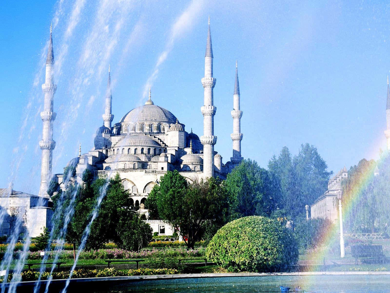 Mezquitaazul En El Cielo Azul Con Un Arcoíris Fondo de pantalla