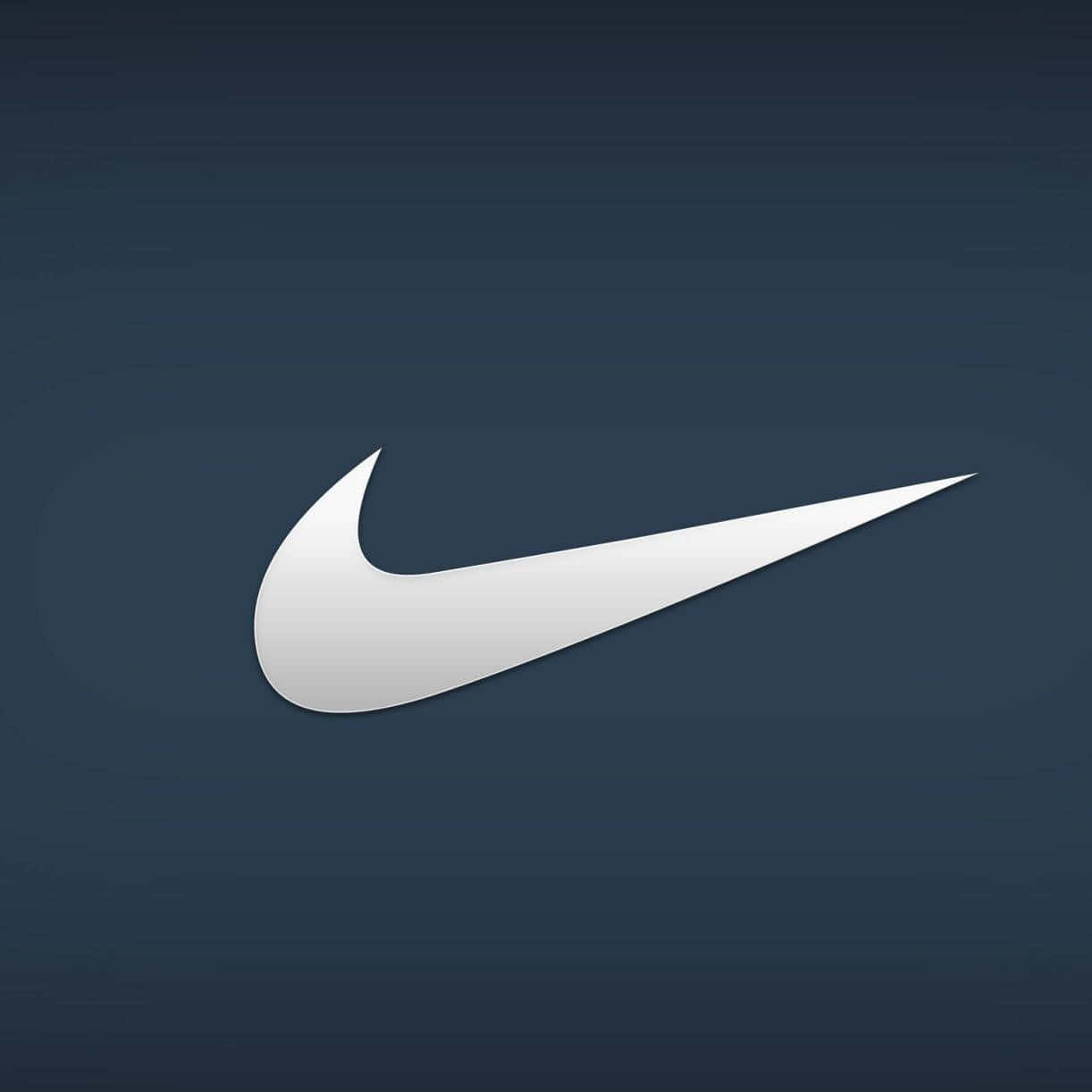 Logoetfra Nike Med Den Karakteristiske Swoosh I En Lys Blå Farve. Wallpaper