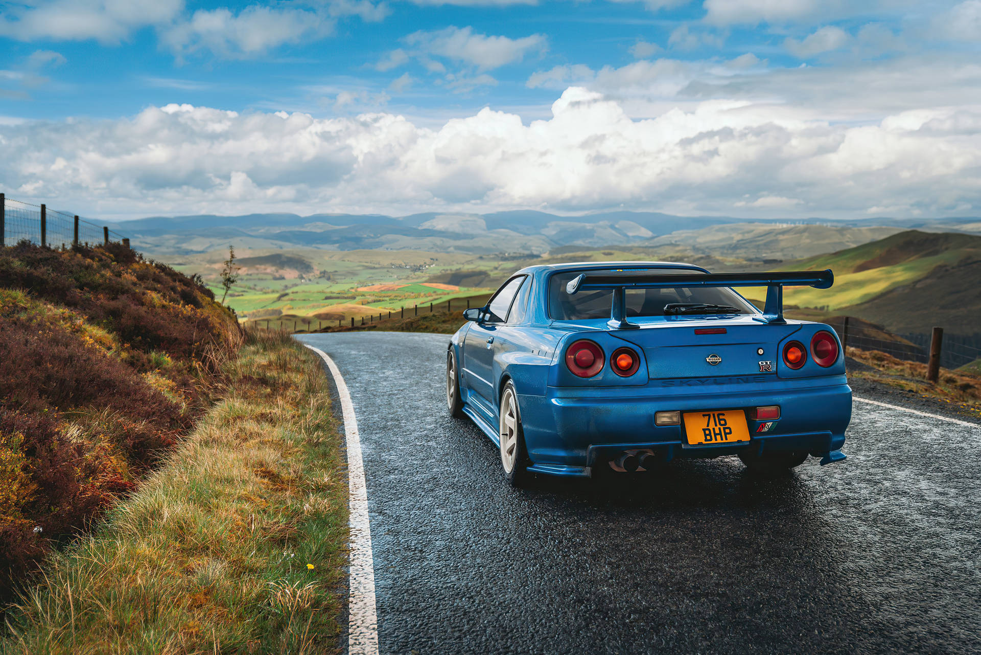 Blue Nissan Skyline Gtr R34 At Hills Wallpaper