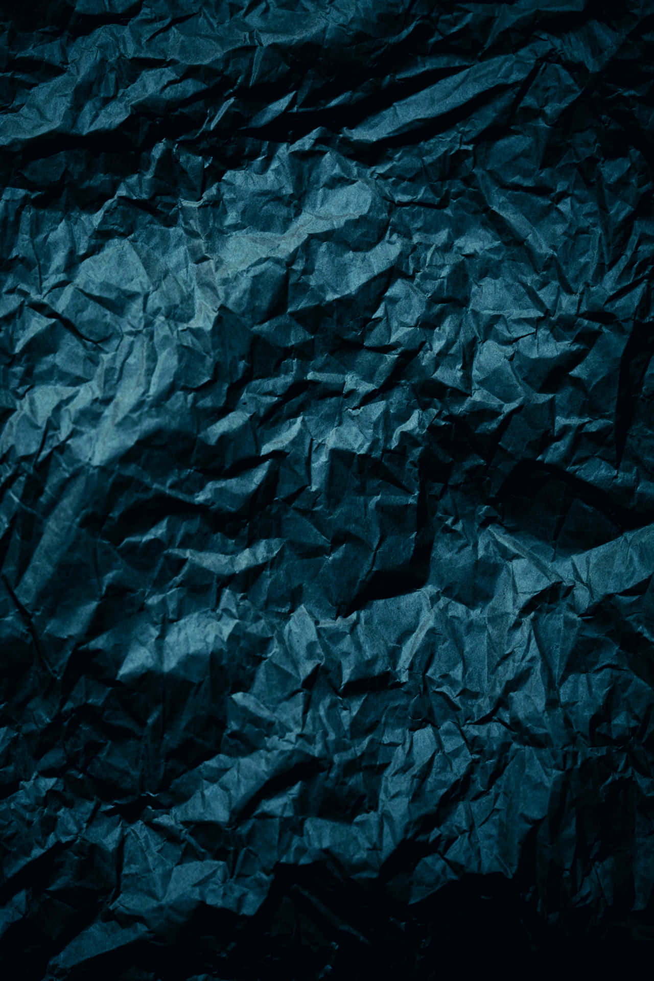 A Blue Crumpled Paper Background